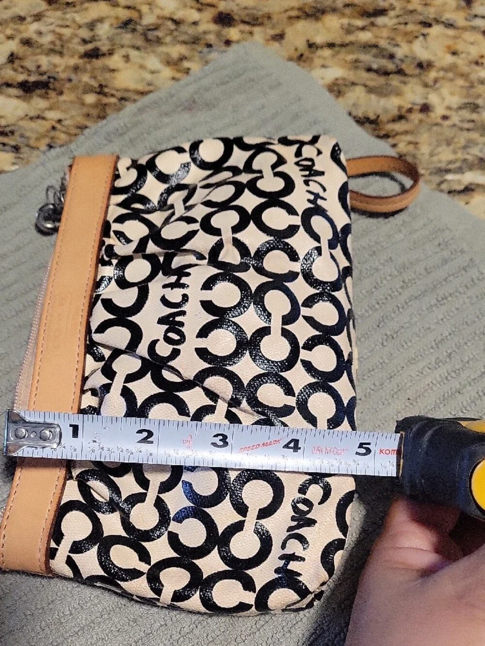 Coach Black and Cream Signature C Canvas Wristlet with Tan Leather Trim